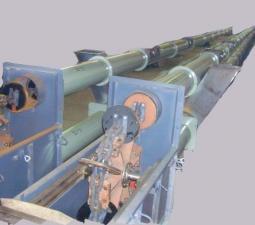 Скребковый трубный конвейер